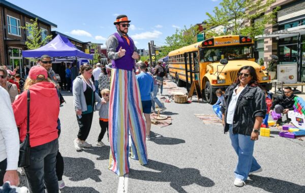 stilt walker at an outdoor event