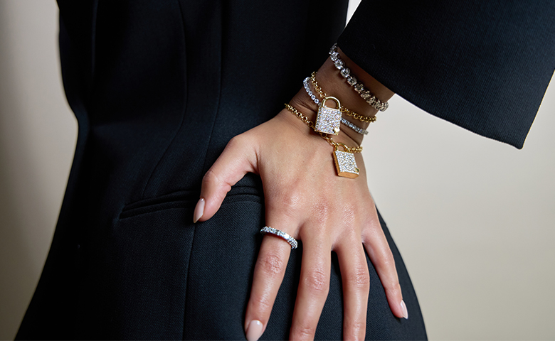 person's hand adorned with jewelry