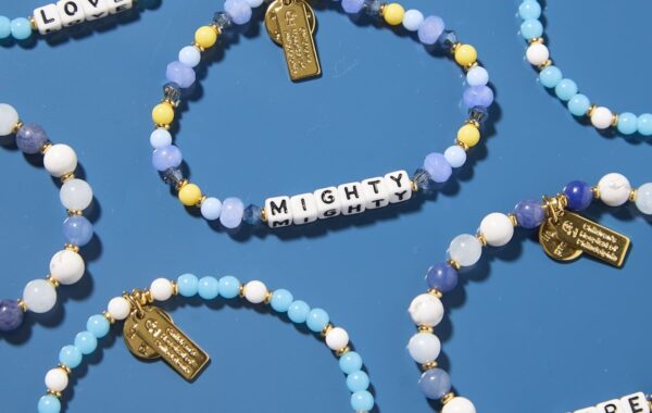 charm bracelets on a blue background